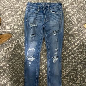 American Eagle Frayed Ankle Jeans
